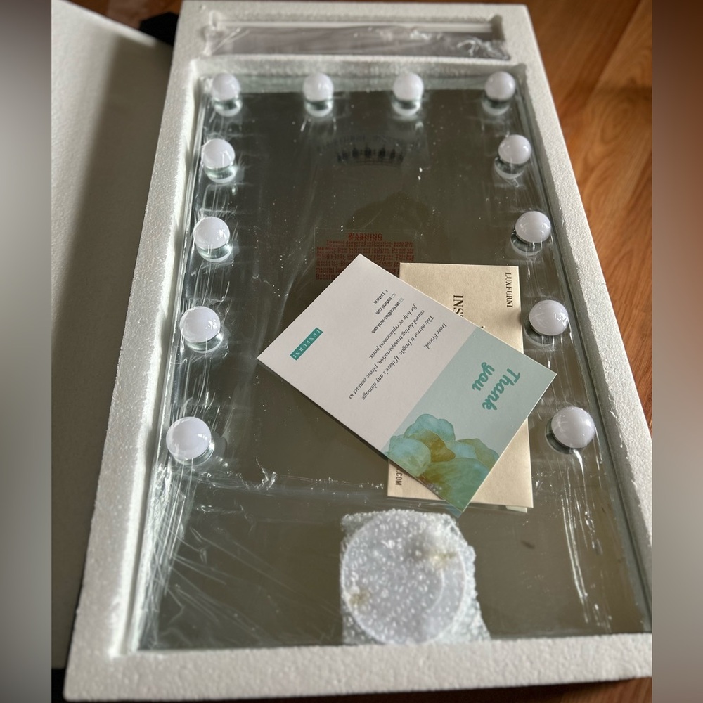 White vanity mirror